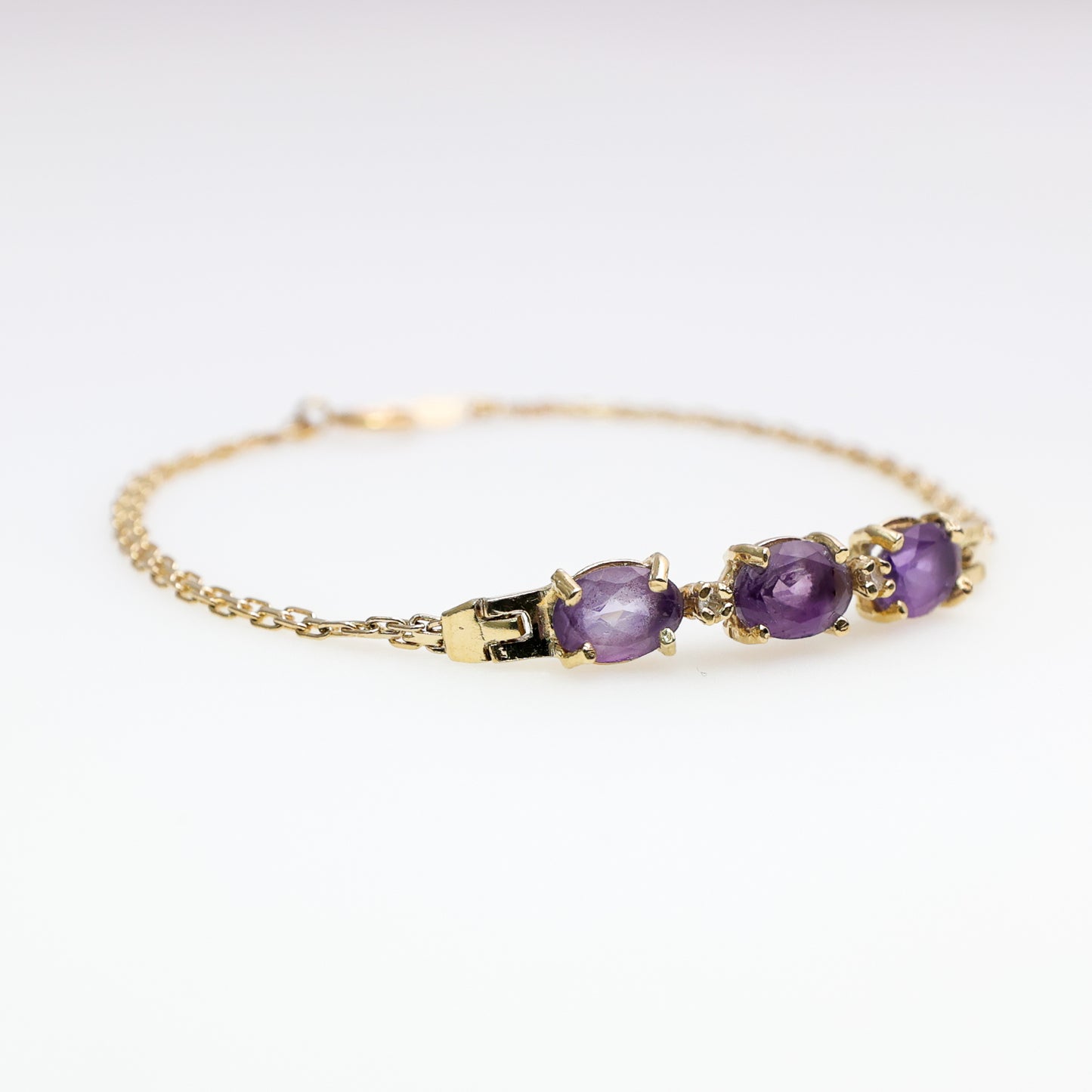 14K Yellow Gold Bracelet with Purple Stones