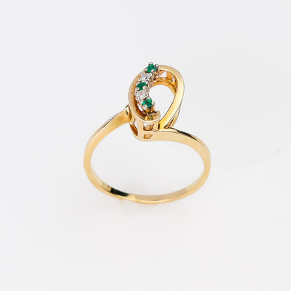 14k Ring with Small Green Stones