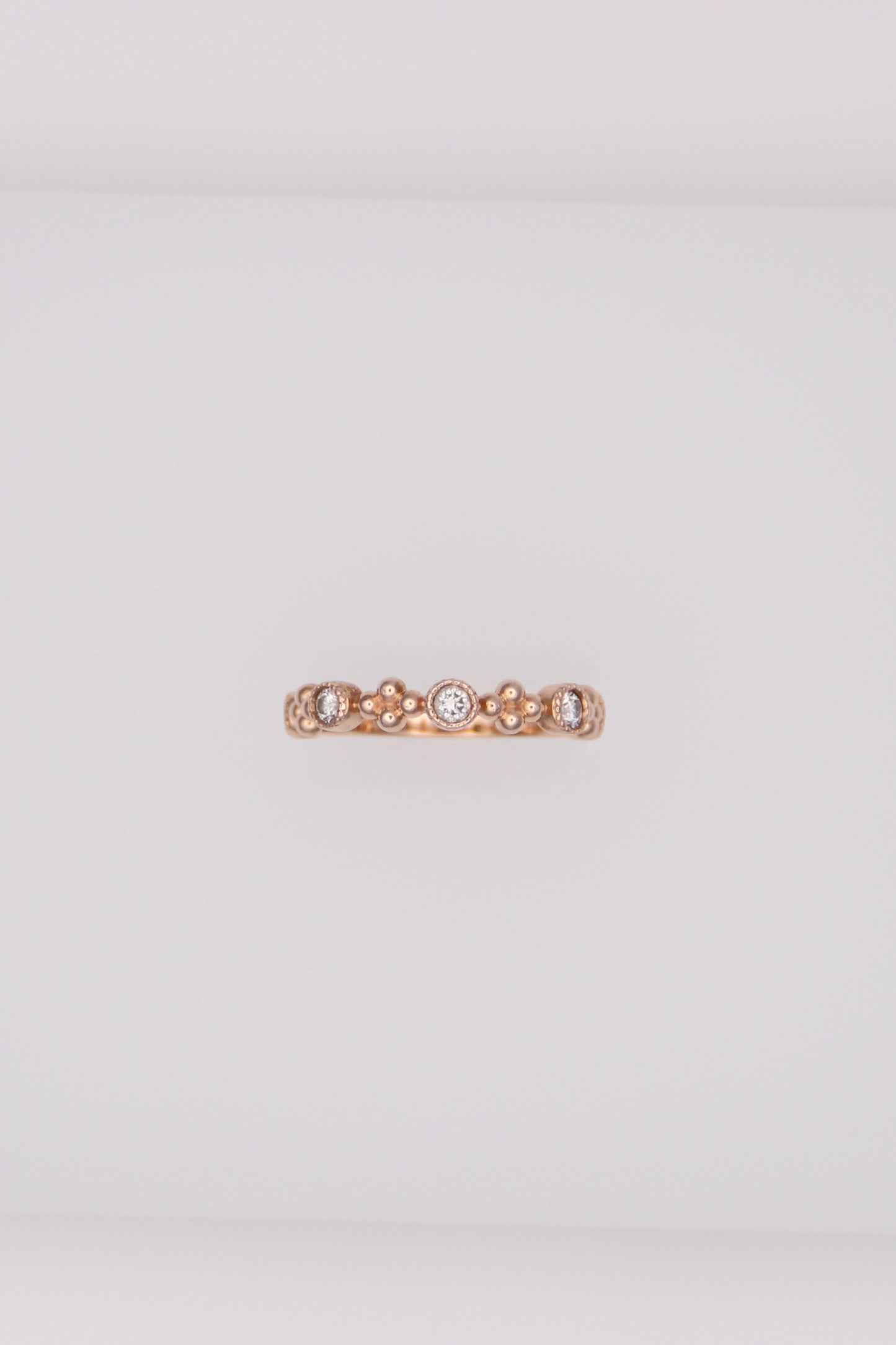 14K Rose Gold Ring with 5 Small Diamonds