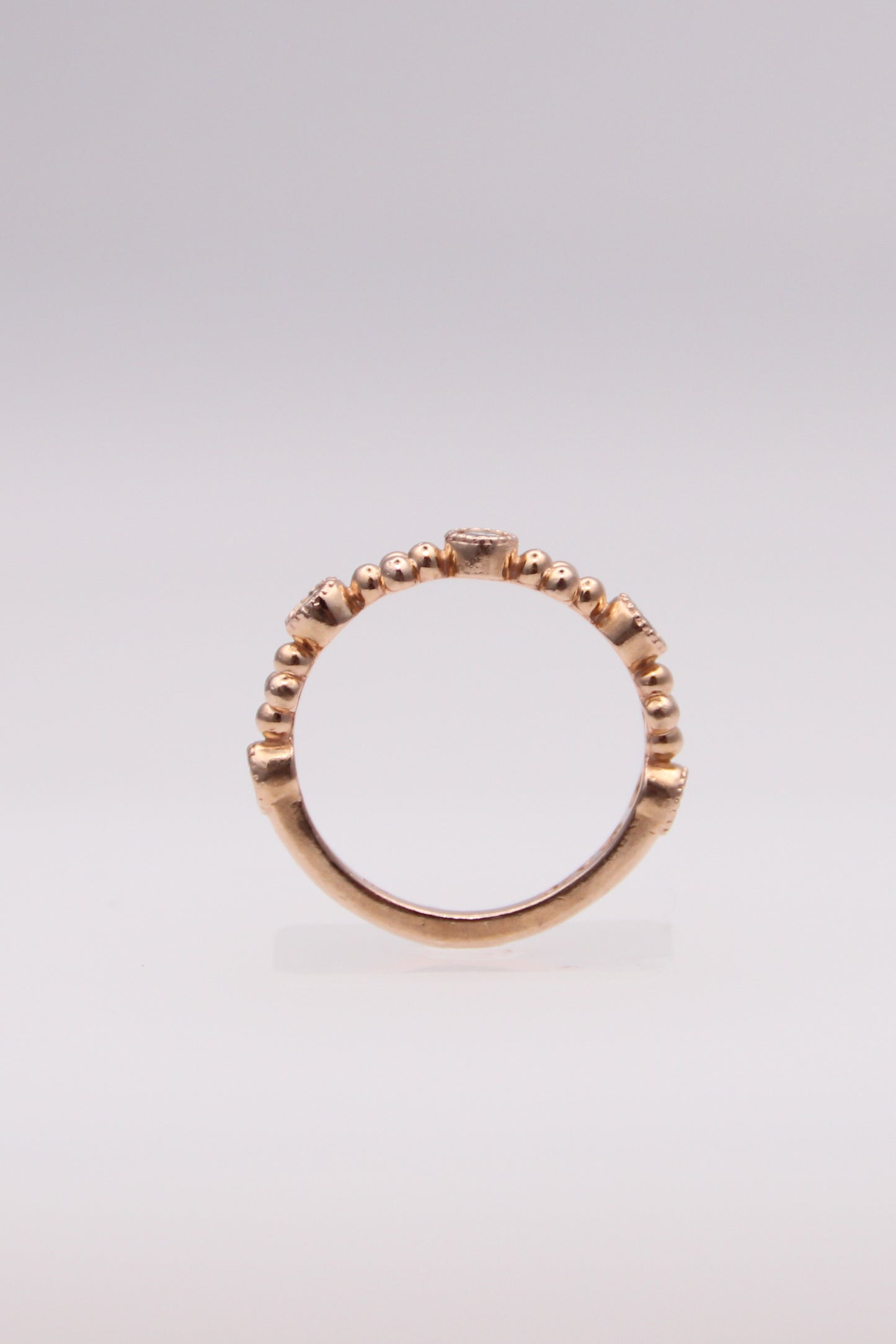 14K Rose Gold Ring with 5 Small Diamonds