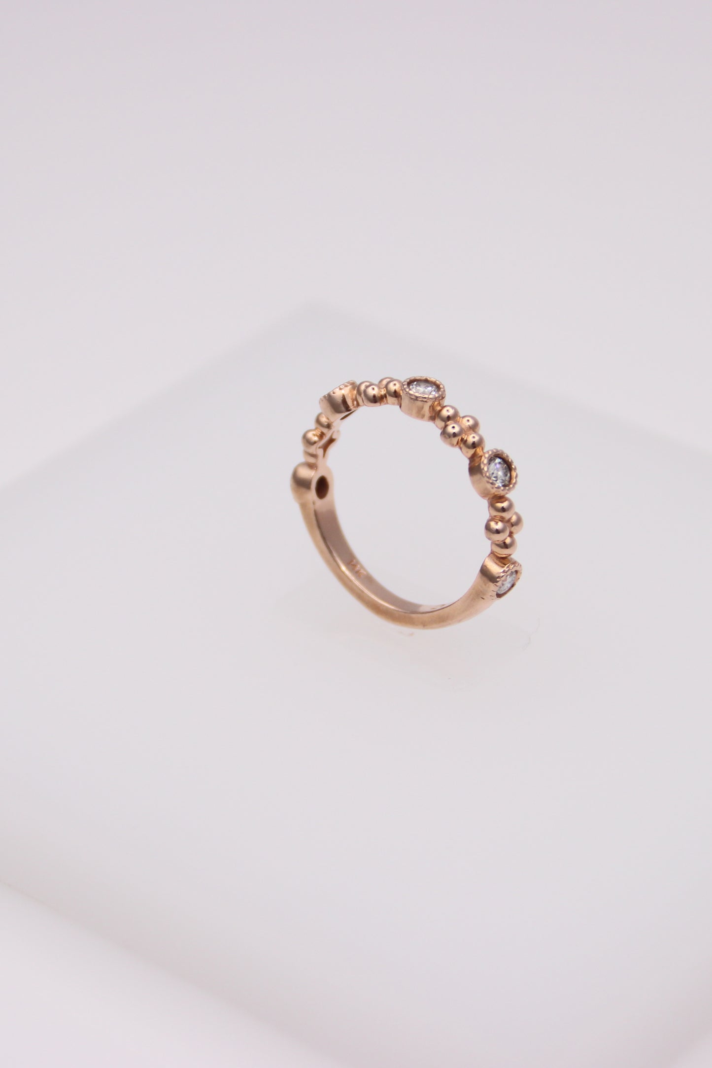 14K Rose Gold Ring with 5 Small Diamonds