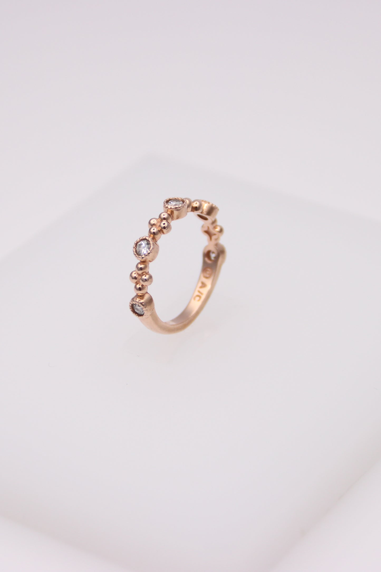 14K Rose Gold Ring with 5 Small Diamonds