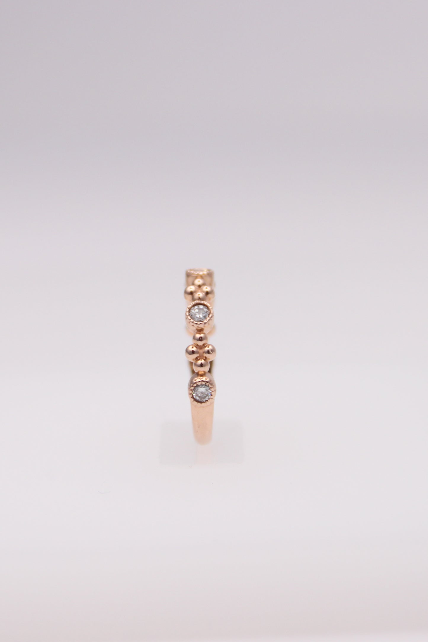 14K Rose Gold Ring with 5 Small Diamonds