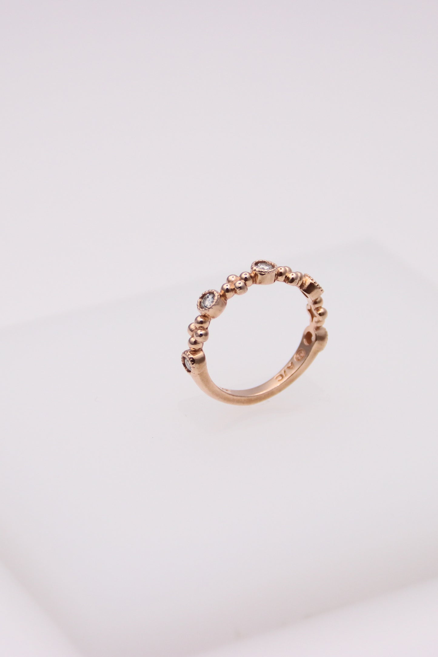 14K Rose Gold Ring with 5 Small Diamonds