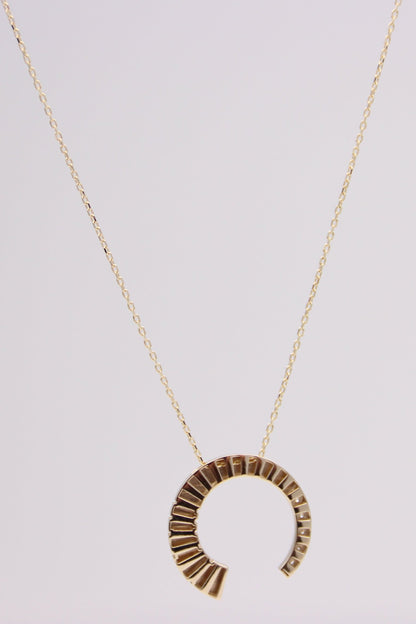 Crescent pendant necklace