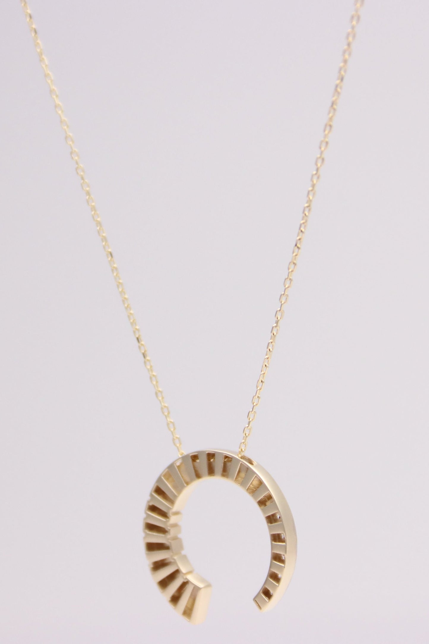 Crescent pendant necklace