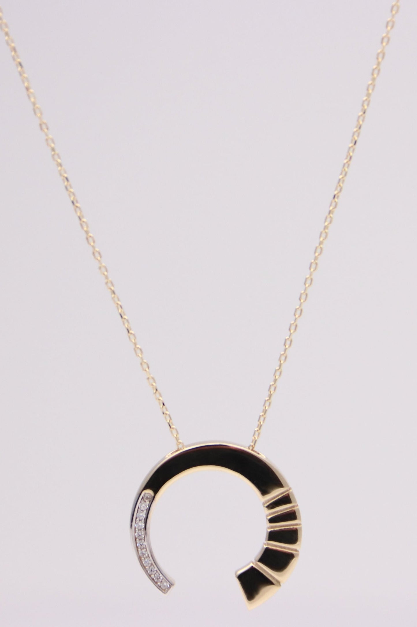 Crescent pendant necklace