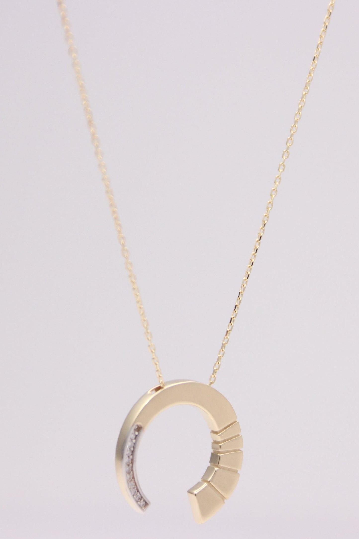 Crescent pendant necklace