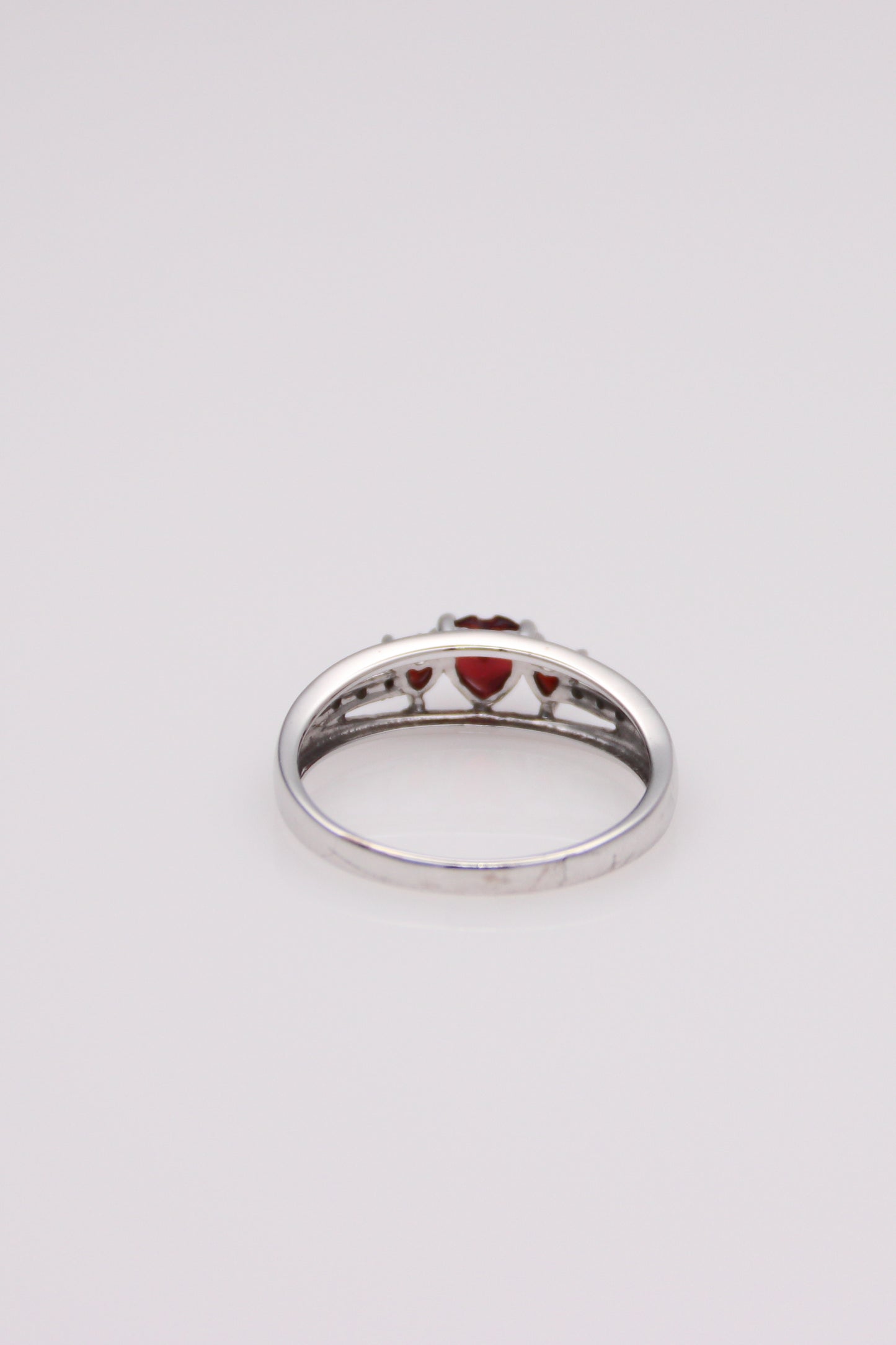 10K White Gold Ring with Heart Stones