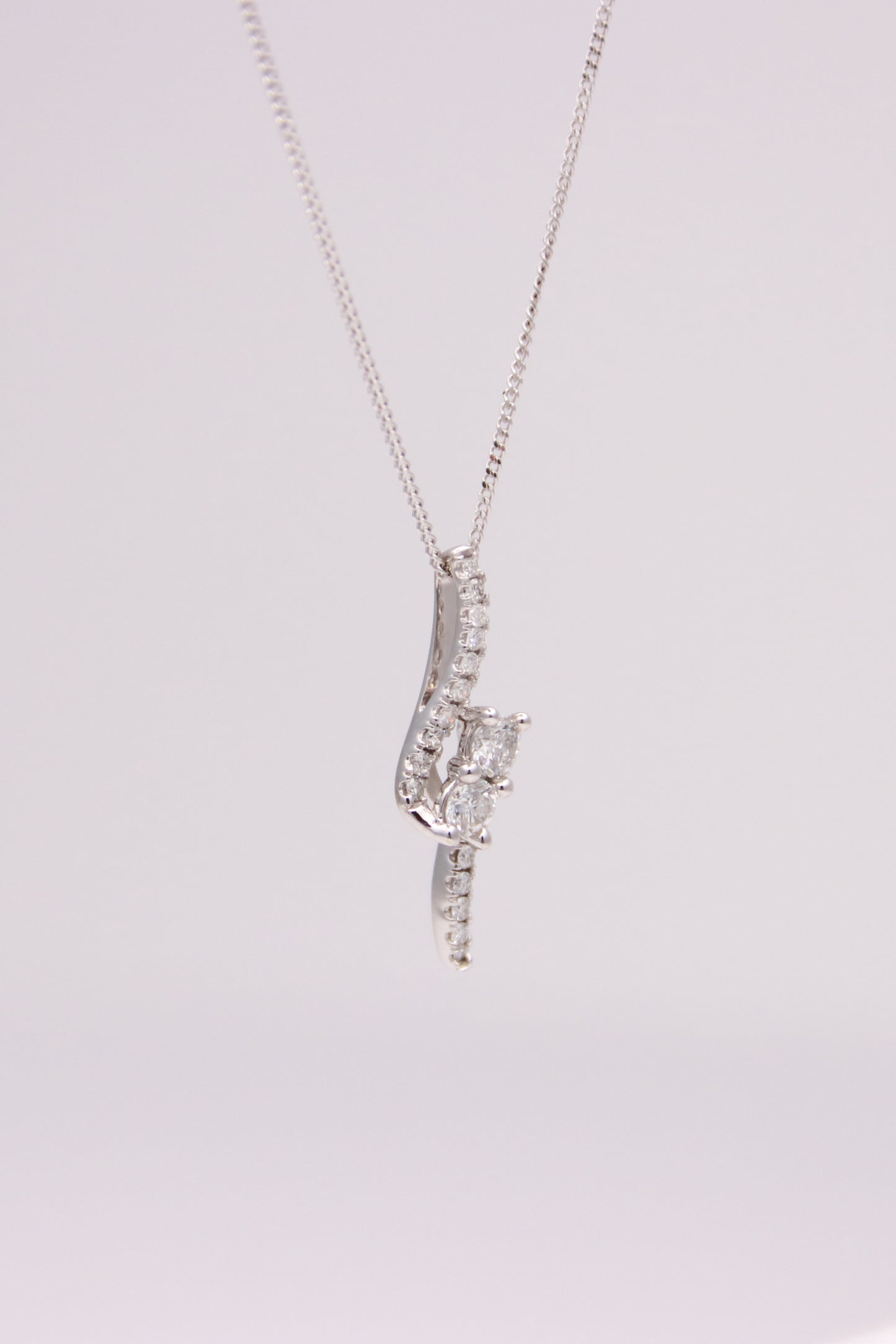 14K White Gold Waved Diamond Pendant Necklace