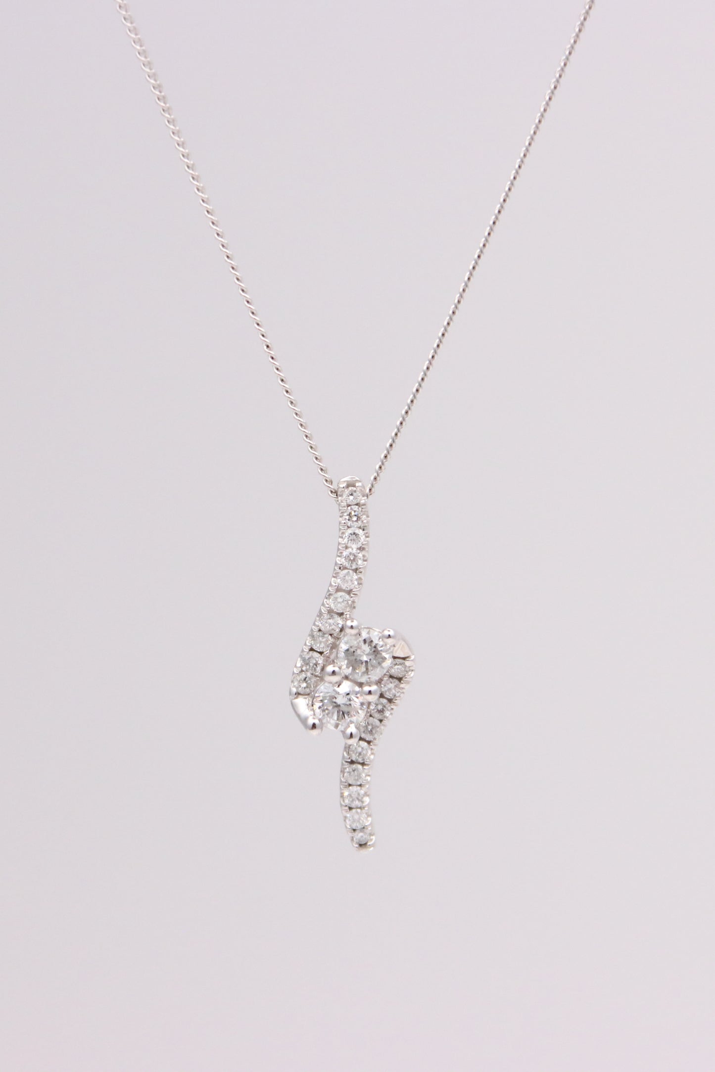 14K White Gold Waved Diamond Pendant Necklace